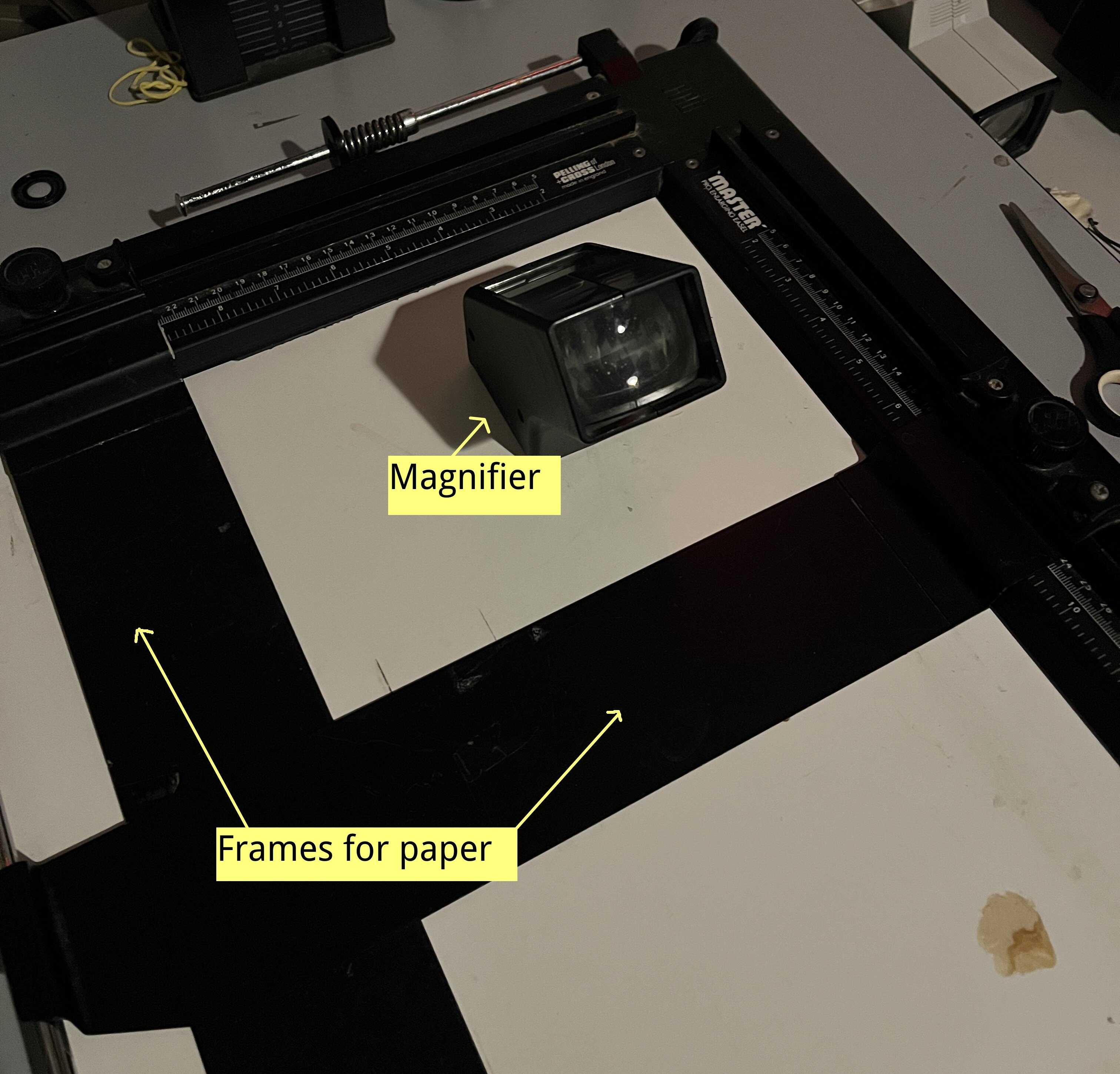 Paper holder and magnifier